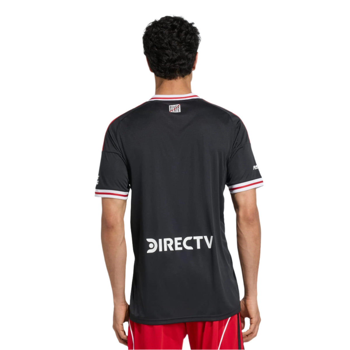 Person wearing a black sports jersey with visible branding on a white background