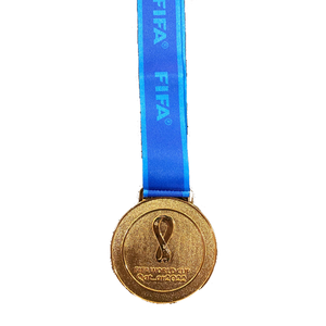 Medalla de campeón de la Copa del Mundo de Qatar 2022